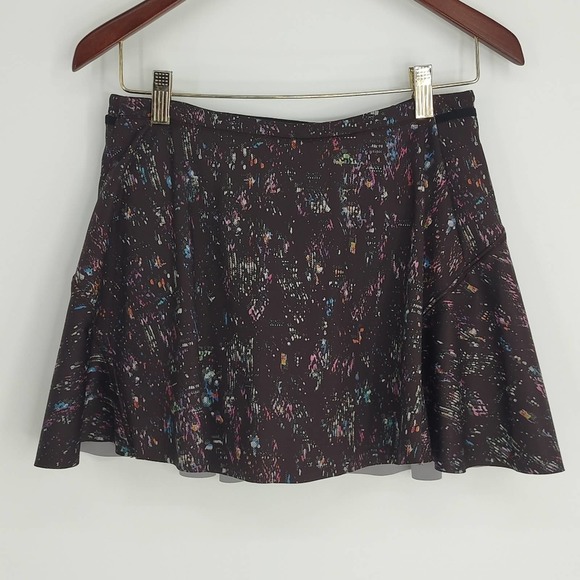 Athleta Match Point Skort Athletic Tennis Golf Pockets Black Splatter Size XS - Picture 1 of 7